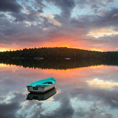 Boat on lake at sunset, Kåsjön, Gothenburg, Sweden