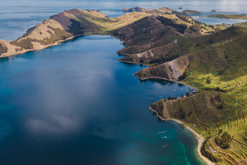 Aerial view of Island of the Sun (Spanish: Isla del Sol ) coastline on Titicaca Lake, Bolivia,...