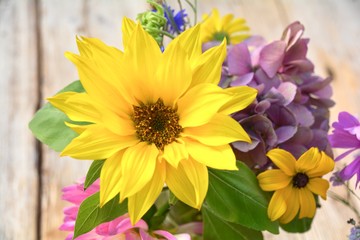 Beautiful bouquet of sunflowers and hydrangea