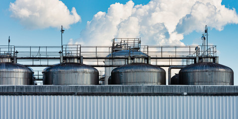Panoramic view of beer production process tanks.