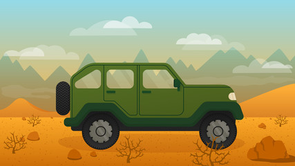 Green off-road car in desert on mountains background