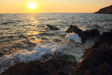 Rock and stone on the sunset at Khao Leam Ya ,Rayong Thailand,Amazing beach sunset. Long Exposure.