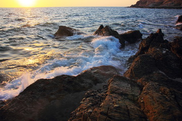 Obraz premium Rock and stone on the sunset at Khao Leam Ya ,Rayong Thailand,Amazing beach sunset. Long Exposure.