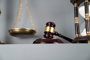 Lawyers office concept. Law symbols composition on off-white background.