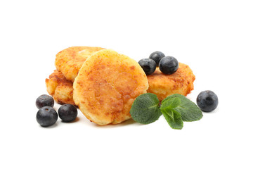 Cheese pancakes, blueberry and mint isolated on white background