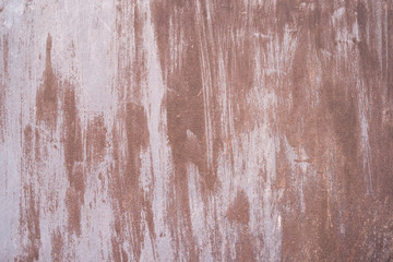 The texture of a sheet of iron painted with paint, subject to corrosion.