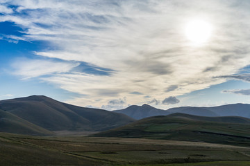 landscape with mountains and clouds