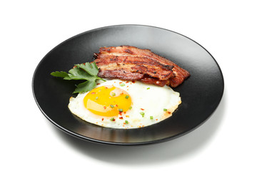 Plate with omelette and bacon isolated on white background