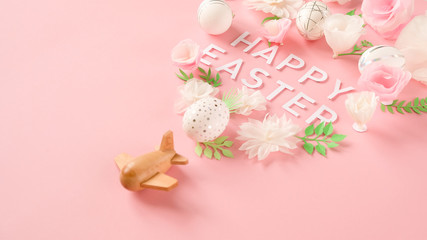 White easter eggs with silver pattern and pink flowers