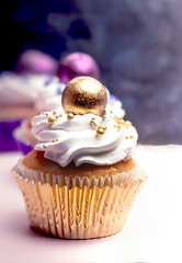 Sweet, colorful cupcakes decorated with sugar paste and cream. Concept of art paty.