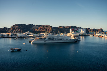 Fototapeta na wymiar Two yachts docked in the Muscat bay, Oman