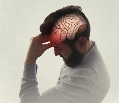 Concept of Head Pain. Sad man with headache, migraine, stress, PTSD etc. Image