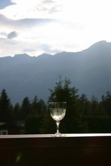 Glass of Wine on a Mountain View for Vacation Celebration
