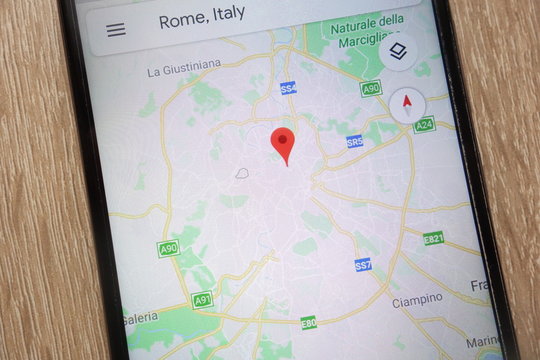 KONSKIE, POLAND - AUGUST 25, 2018: Rome location on Google Maps displayed on a modern   smartphone