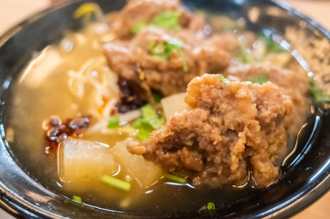 Taiwanese food of soup noodles with pork ribs cakes