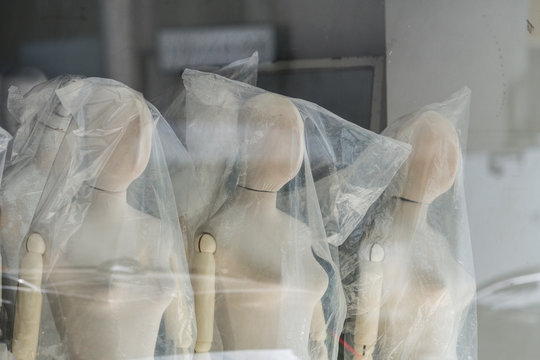 Boutique display window with mannequins