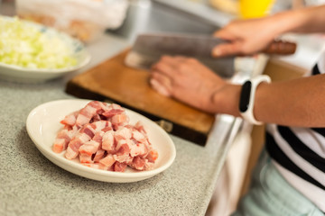 cut raw pork on wooden table