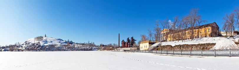 Fototapeta na wymiar Panorama. Fox Mountain with a tower and the building of the former Demidov plant management. Manager's house and outbuilding. Nizhny Tagil. Russia