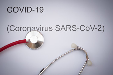 Coronavirus text written and stethoscope isolated 