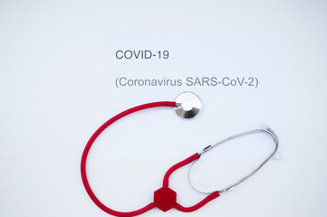 Coronavirus text written and stethoscope isolated 