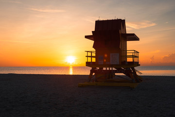 Iconic Miami Beach hut during sunrise with powerful clouds on a calm summer morning in Miami Beach (Miami, Florida, USA)