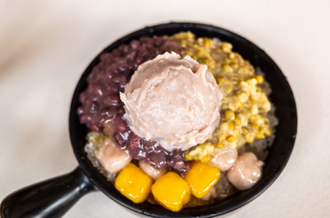 cold shaved ice with colorful dessert