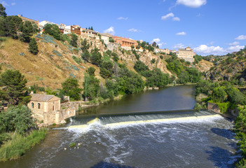 Fototapeta na wymiar The picturesque steep banks of the Tagus River. Toledo. Spain