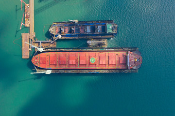 Aerial view shipyard at sea In the process of assembling a container ship.