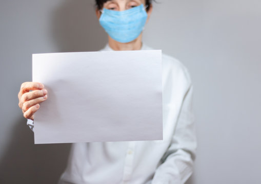 Coronavirus quarantine and Air pollution pm2.5 concept. Old sick woman wearing respirator mask for protect. Wuhan, China epidemic virus symptoms background, copy space.