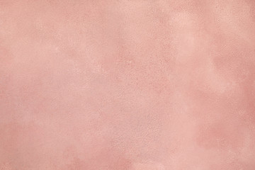 Pale pink colored low contrast Concrete textured background with roughness and irregularities....