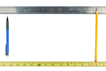 Frame of pencils and rulers on a white background.