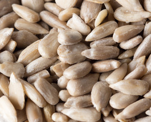 peeled sunflower seeds as background