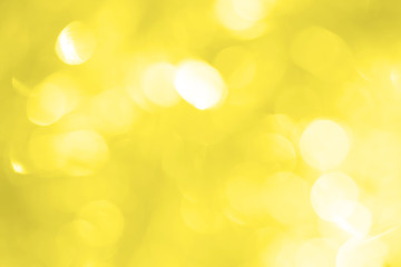 Yellow brilliant background with splits and glare for New Year's greeting card. Wallpapers for various purposes.