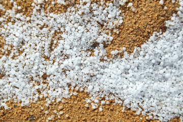 Snow pellets, graupel or soft hail on the ground. Form of precipitation