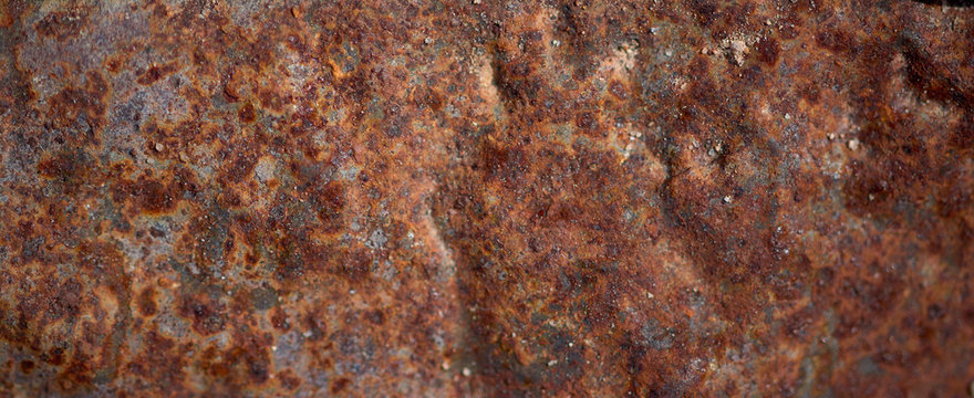 Detail Of A Piece Of Abandoned Rusty Sheet Metal With Copper Color And Rust