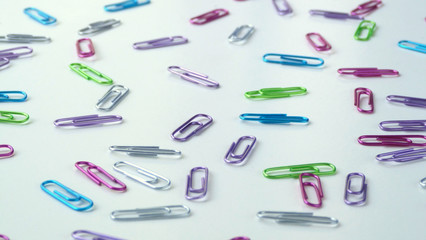 Close up of Colorful Paper Clips on a White Background | Back To School Supplies