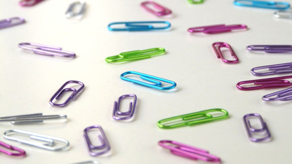 Close up of Colorful Paper Clips on a White Background | Back To School Supplies
