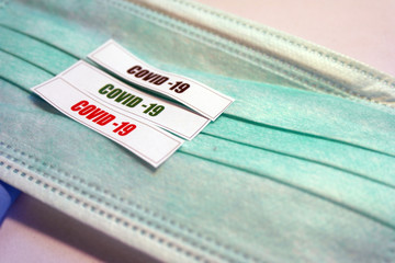 Covid-19, Corona virus writhed on paper Negative testing etiquette on face mask