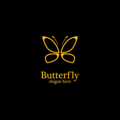 Golden butterfly on black background.logo template for beauty salon,spa salon,etc.