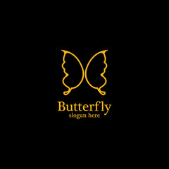 Golden butterfly on black background.logo template for beauty salon,spa salon,etc.