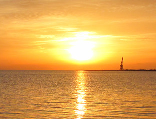 super sunset in early spring over the sea