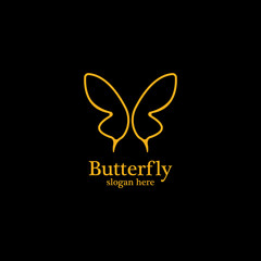 Golden butterfly on black background.logo template for beauty salon,spa salon,etc.