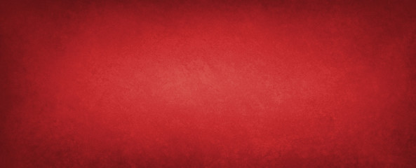 Red background with old vintage paper texture with dark mottled grunge borders in Christmas and Valentines day colors, old plain solid red background template with black vignette border