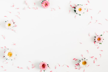 Beautiful flowers composition. Frame made of pink and white flowers on white background. Valentines...
