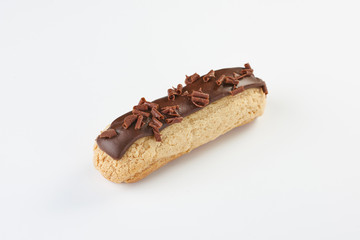 Isolate. Eclair sweet chocolate dessert