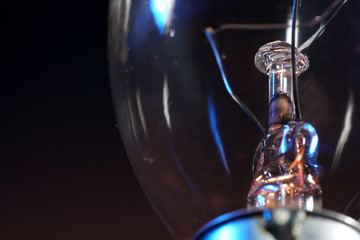 Old lightbulbs in the studio on black background photographed with flash light