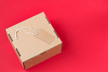 box with  tag on red background