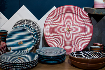 A wide variety of plates bowls and mugs lined up for sale at the Liberty shop at Regent street.