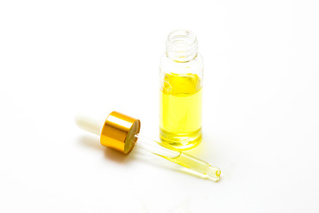 Small bottle of perfume isolated on a white background