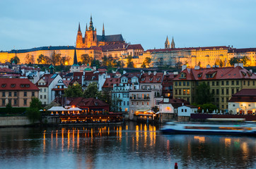 Obraz premium Old Town architecture and Vltava river at night in Prague, Czech Republic.